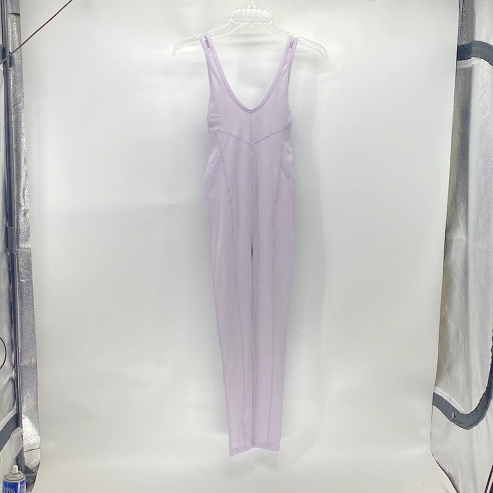 Free People Movement breath deeper jumpsuit sweet lavender athleisure size XS